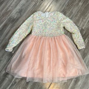 Girls sequins dress with glitter skirt.